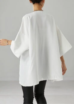 White Oversized Cotton Blouses Asymmetrical Bracelet Sleeve ML2502 10 White Oversized Cotton Blouses Asymmetrical Bracelet Sleeve ML2502 -Ada Fashion White Oversized Cotton Blouses Asymmetrical Bracelet Sleeve4 0ab8b68e 1925 47c2 8cf8 a2278f9a5ce0