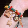 Women Rainbow Hand Woven Mahogany Tassel Charm Bracelet KX1053 1 Women Rainbow Hand Woven Mahogany Tassel Charm Bracelet KX1053 -Ada Fashion Women Rainbow Hand Woven Mahogany Tassel Charm Bracelet1